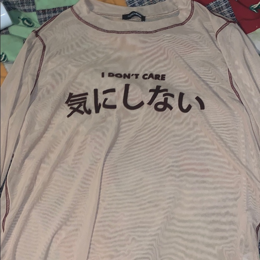 “I don’t care” mesh top